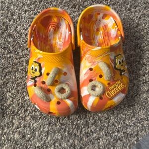 CROCS Orange and Yellow Sandals with Playful Design